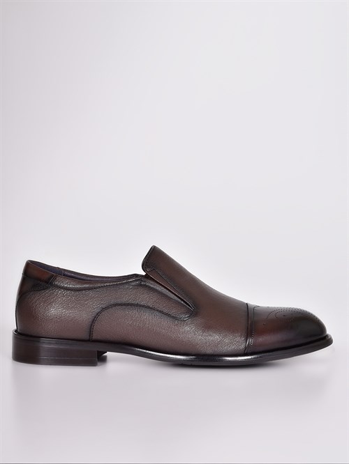 Кожаные туфли коричневого цвета с перфорированным узором